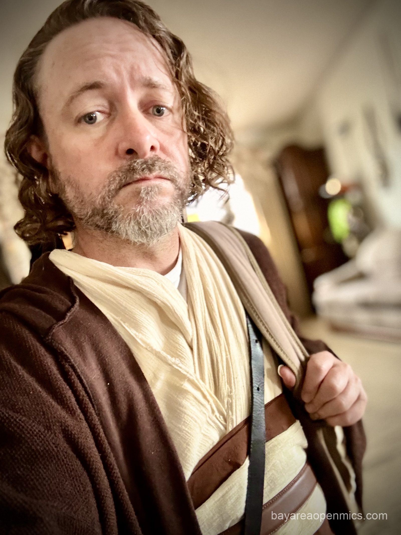 Your author in Jedi robes and guitar, ready for an unusual open mic outing