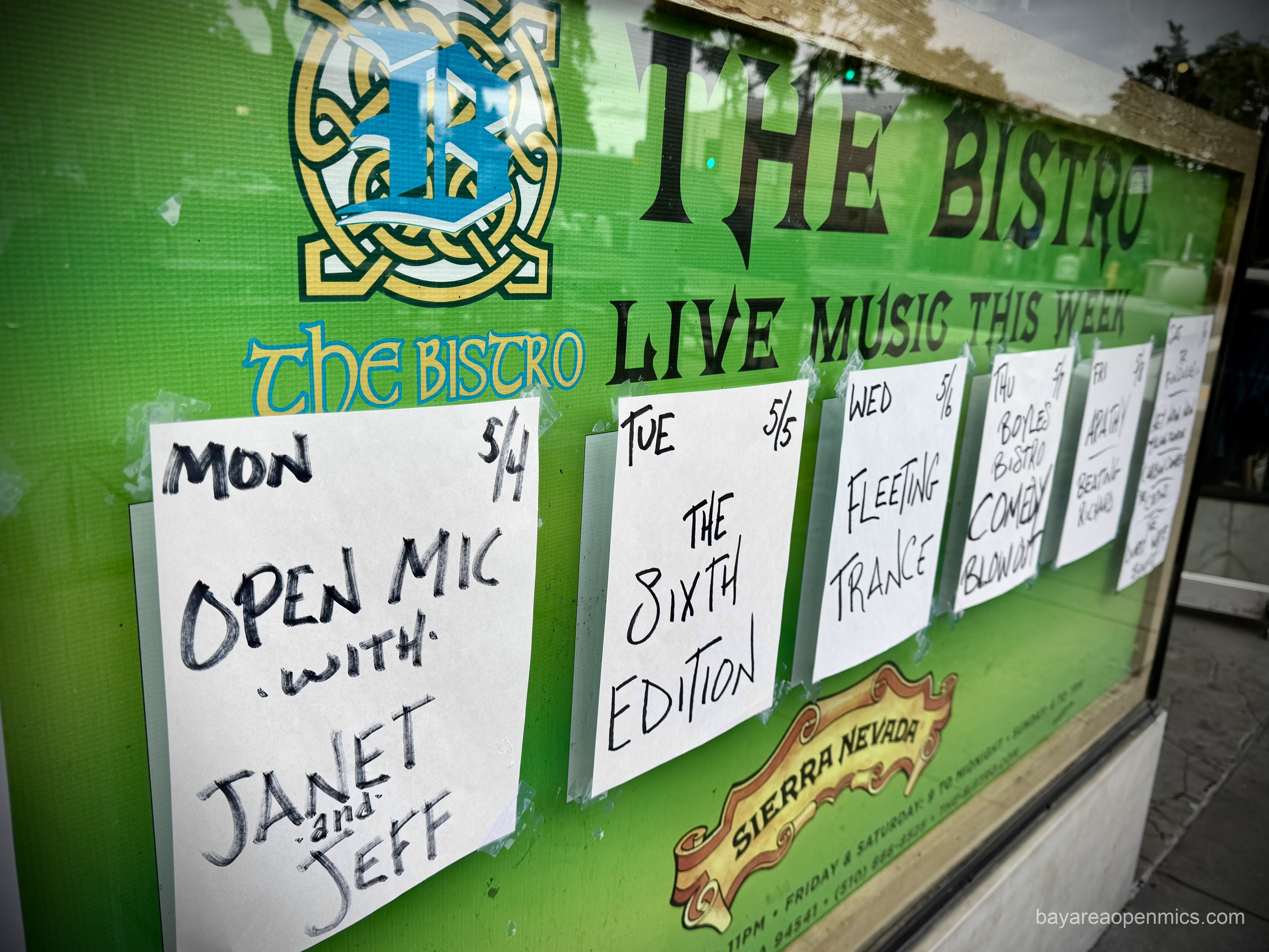 The sign in the window of the Hayward Bistro advertising Janet and Jeff's Monday Open Mic