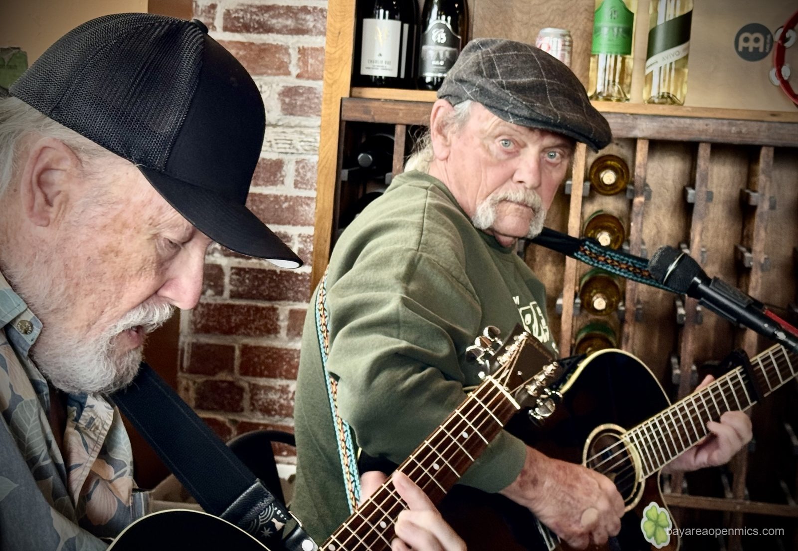 Gabe Duffin and Alex Upper perform together at the Swirl on the Square acoustic open mic in Livermore