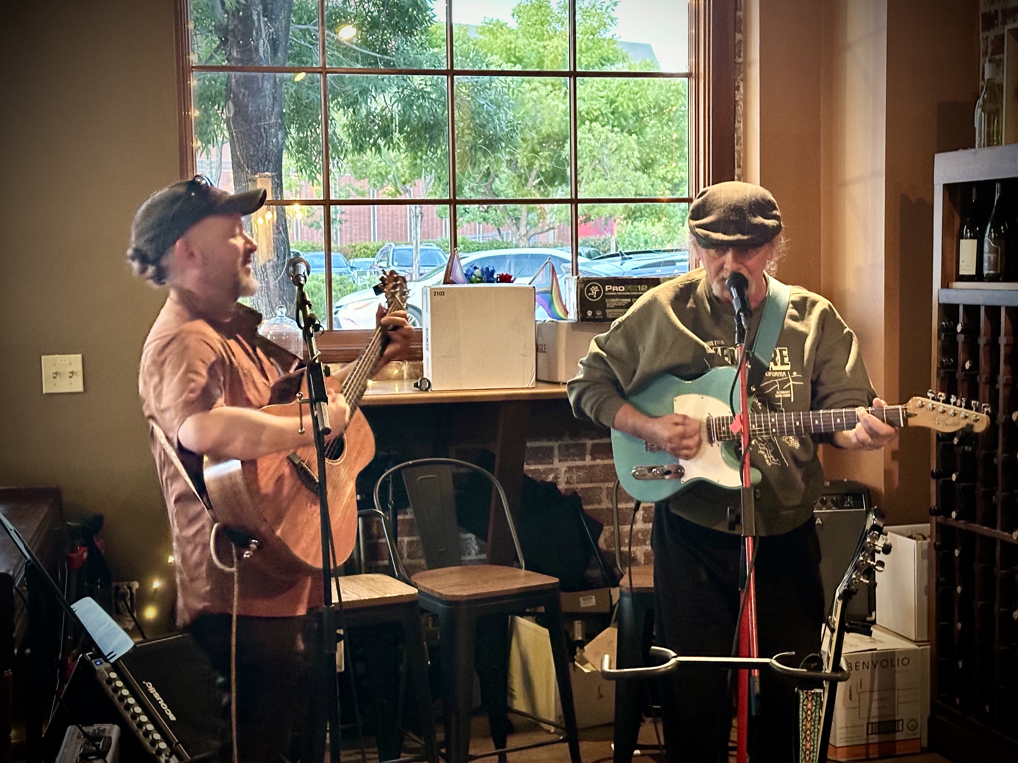 Gabe Duffin and Seán Lightholder perform together at the Swirl on the Square acoustic open mic in Livermore
