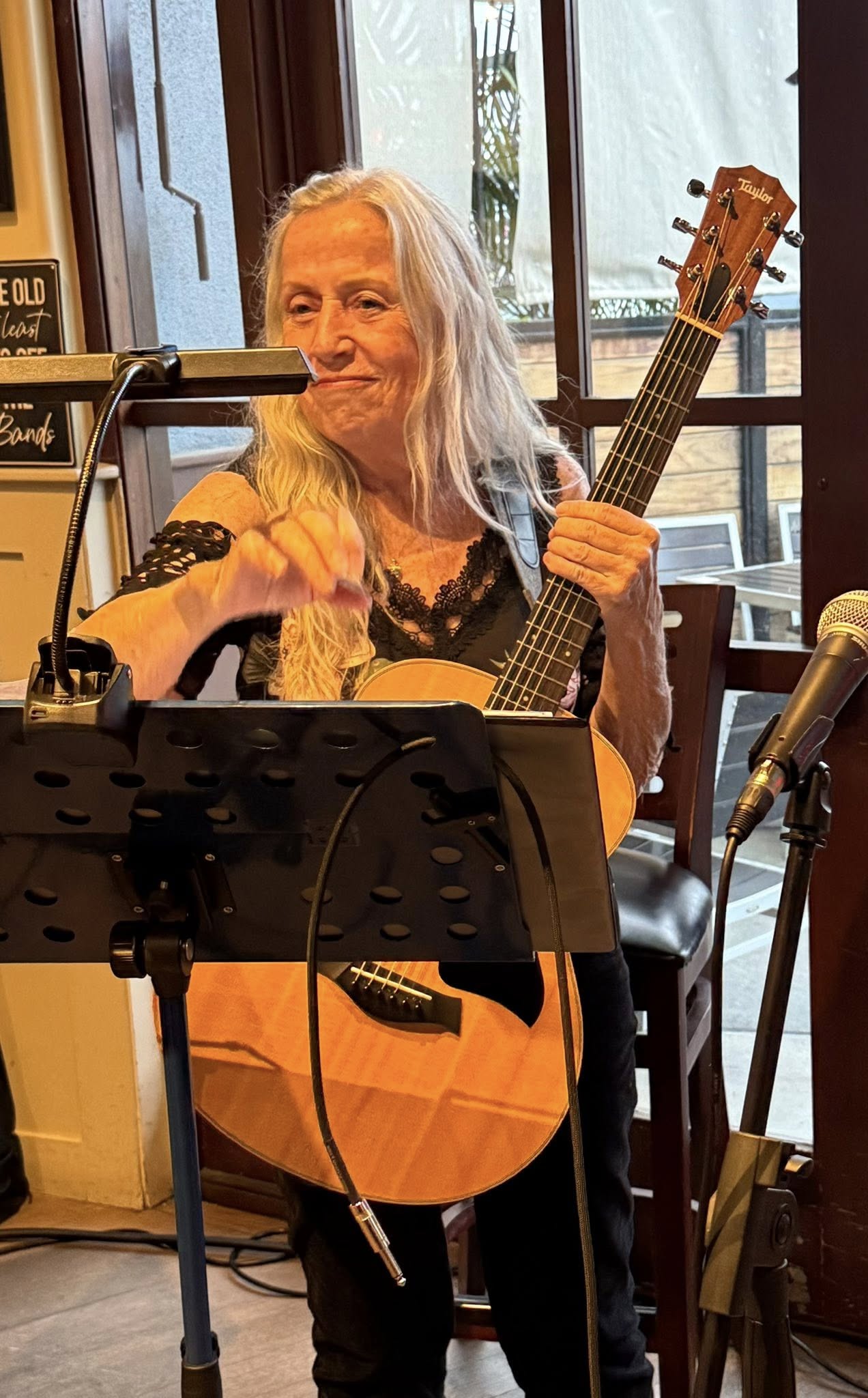 Cathy Cook, host at Capers Open Mic in Campbell, CA