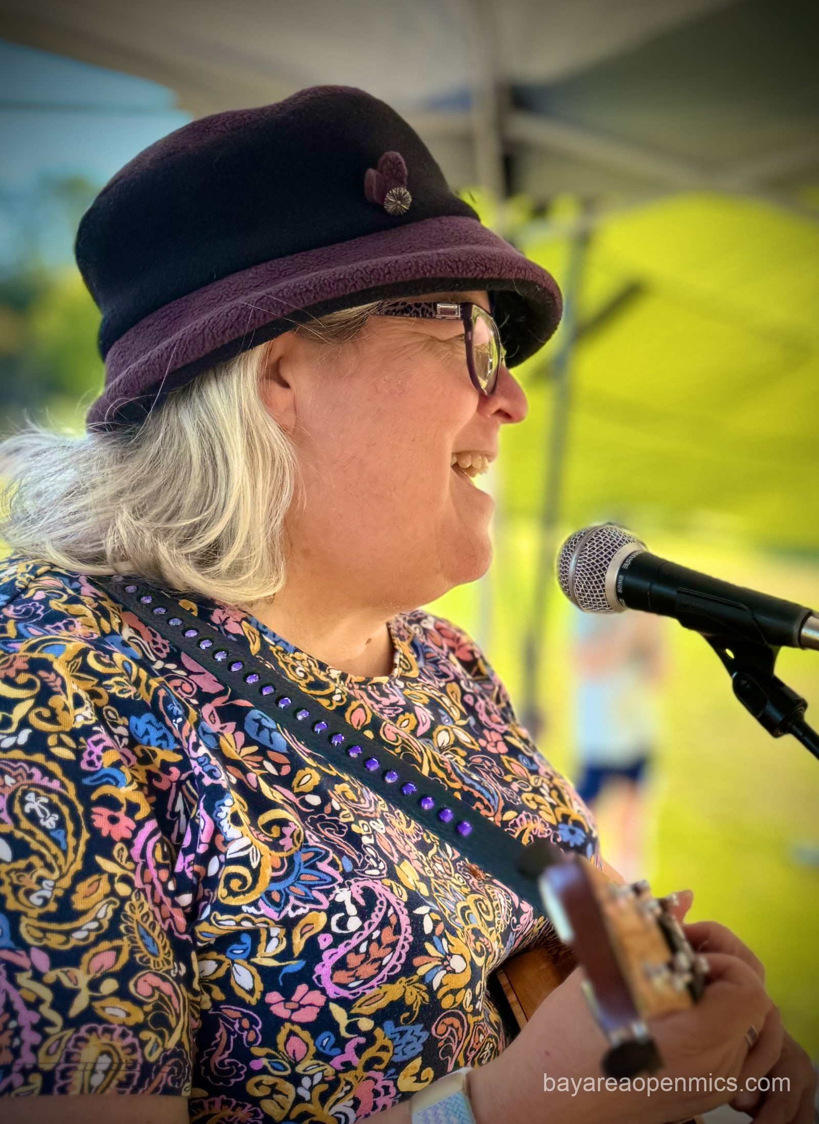 Janet Lenore at the mic at the Hayward Bistro Open Mic