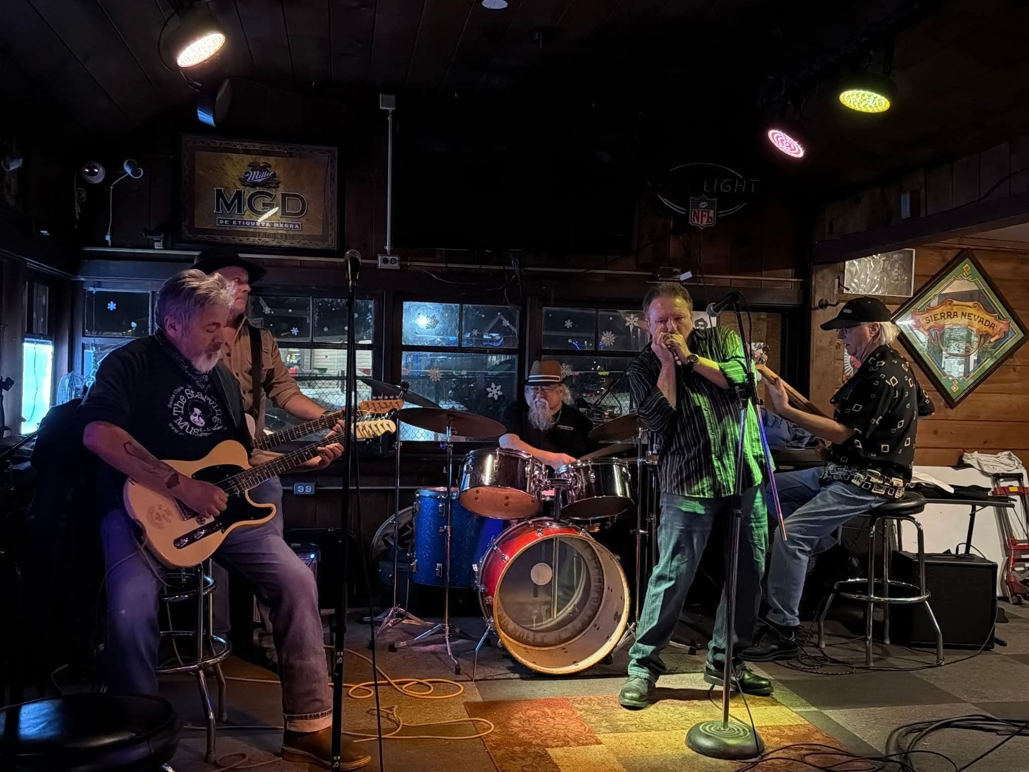 Photo of the performance area at dive bar Henfling's in Ben Lomond, CA