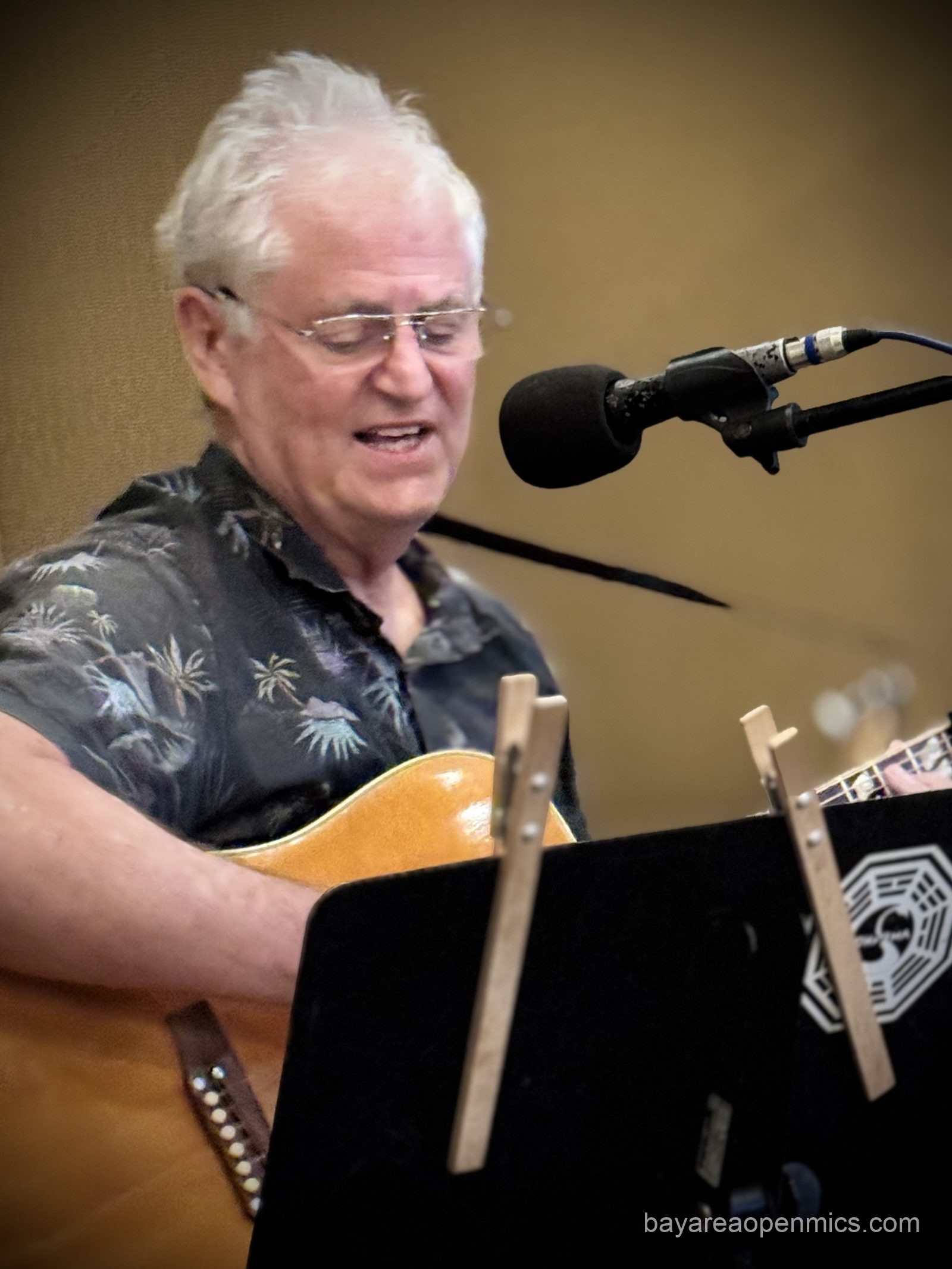 Michael Lusk performs at the Three Flames open mic in San Jose