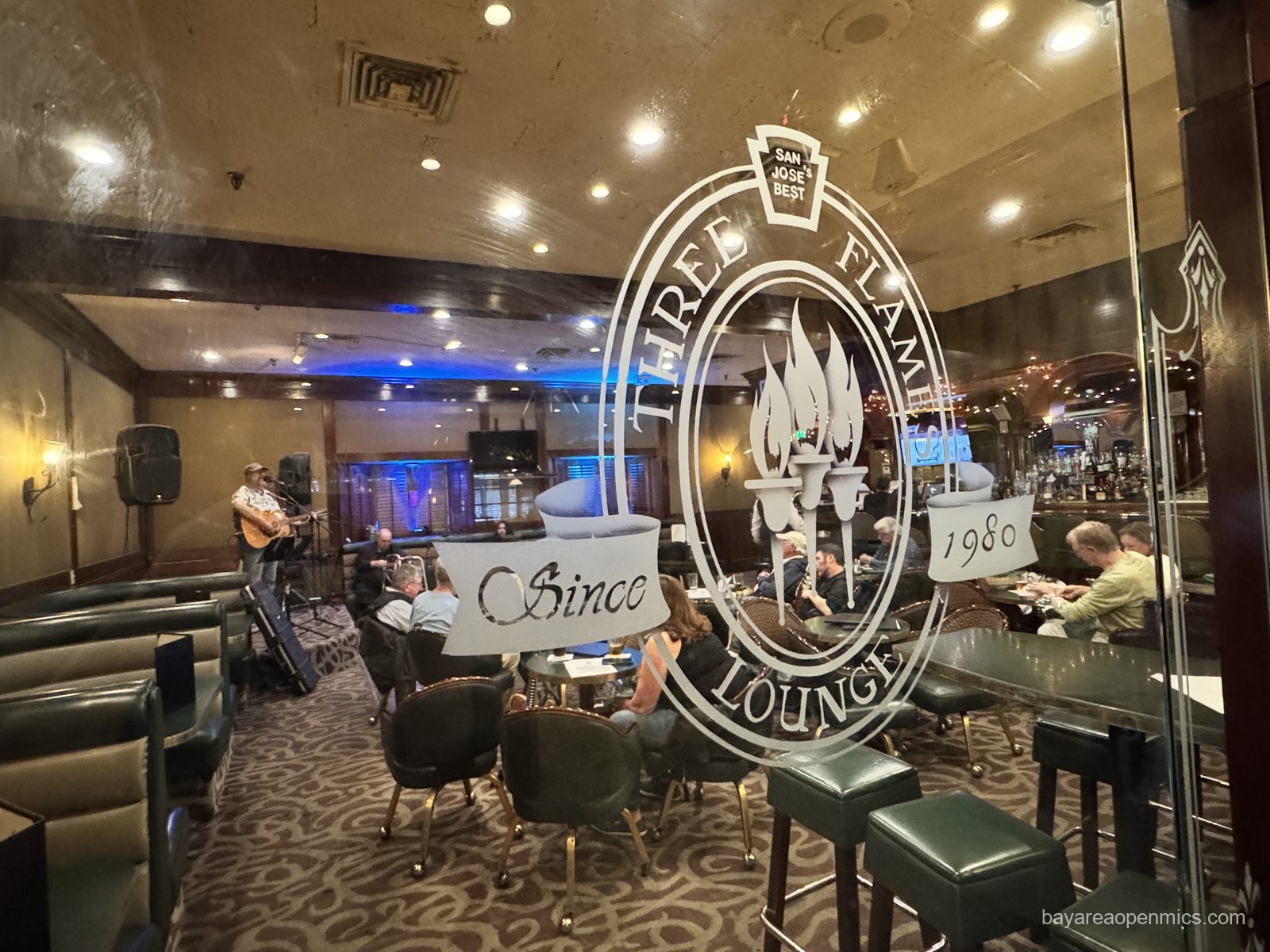 The Three Flames logo on the window at Three Flames Restaurant in San Jose