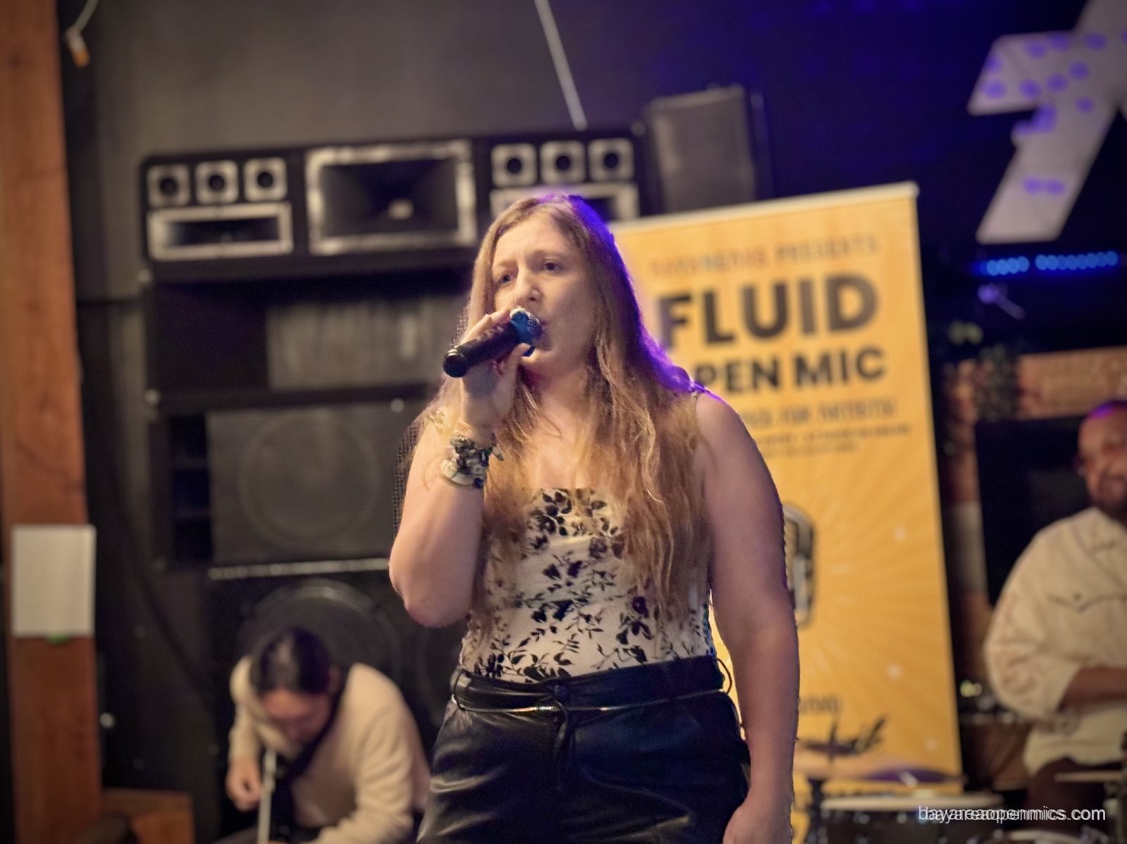 A performer at the Fluid open mic at 7th West in West Oakland
