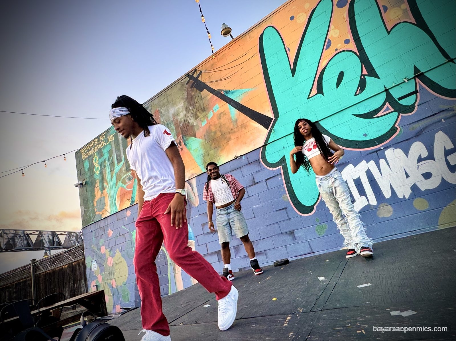 Dancers rehearsing outside 7th West before the Fluid open mic