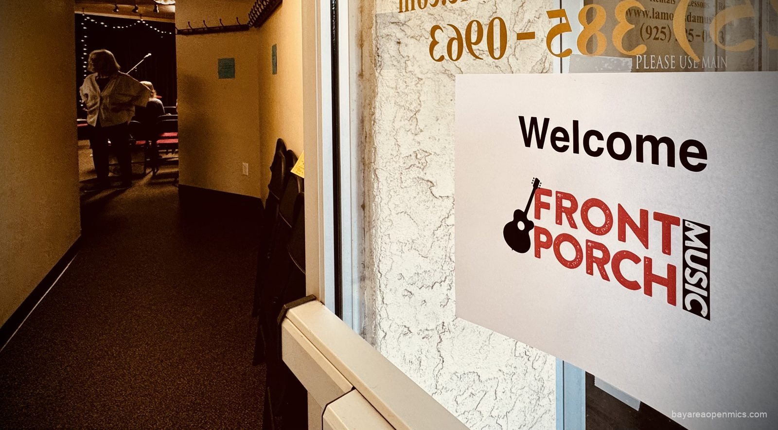 The sign outside Lamorinda Music advertising the Front Porch open mic in Lafayette