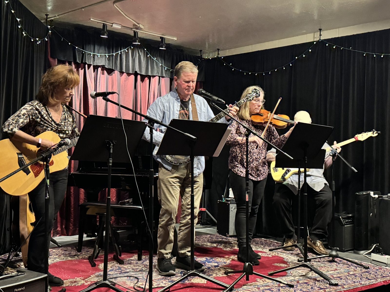 The Old Time String Band performs at the Front Porch Music open mic at Lamorinda Music in Lafayette