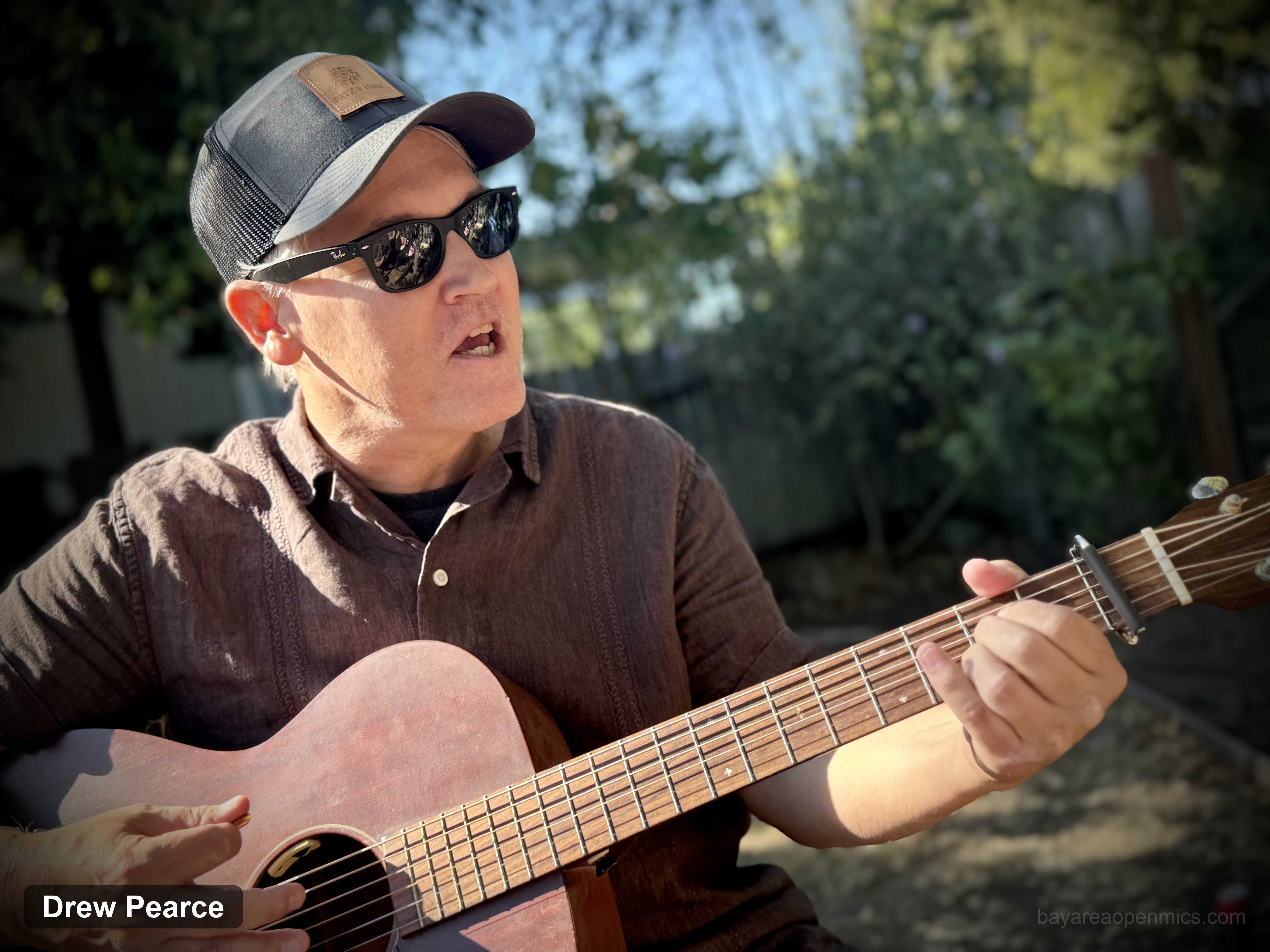 Drew Pearce performing live, host at Secret Song Club Open Mic Music Party in Occidental