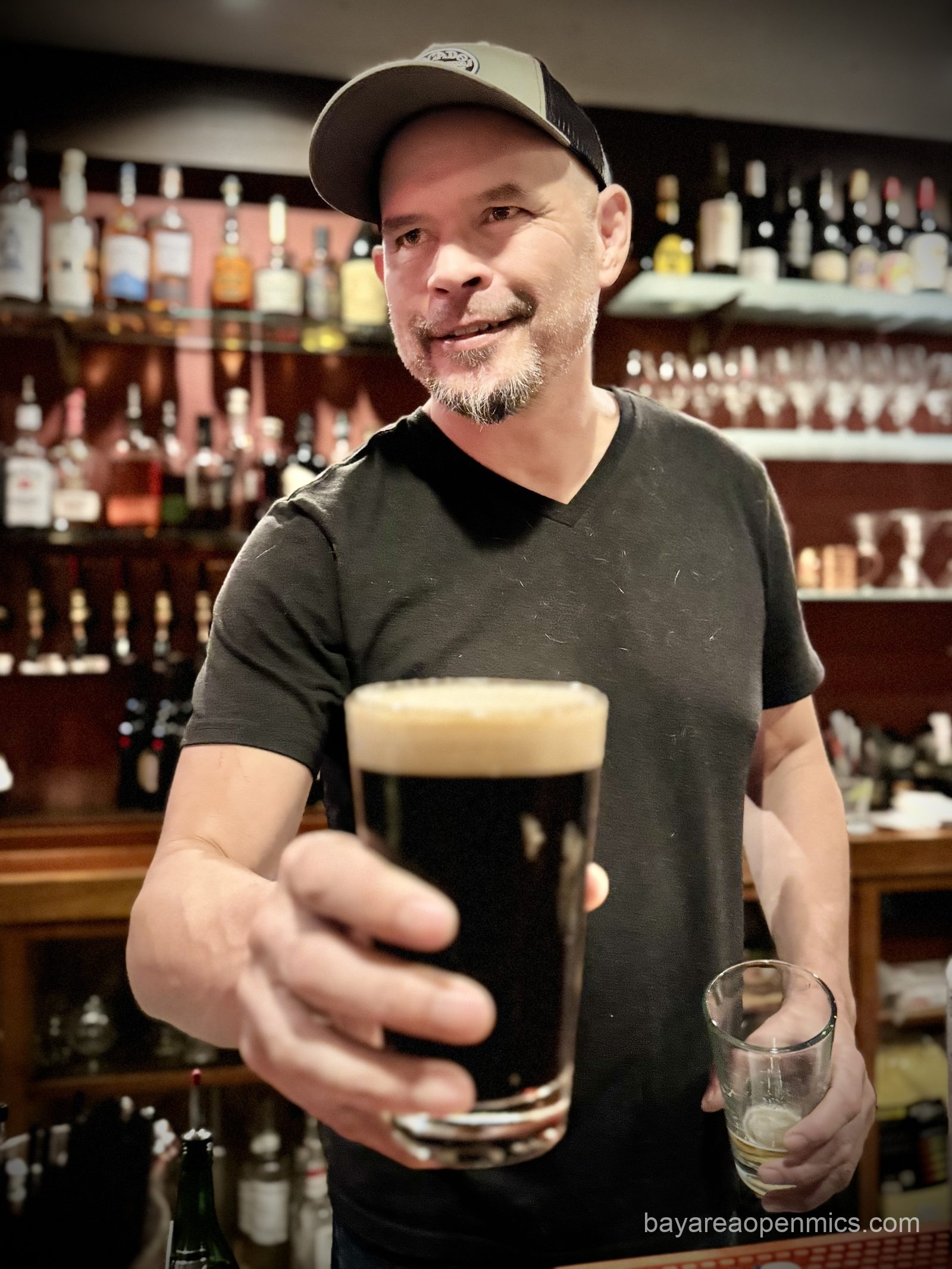 Roger Tschann stands behind the bar at The Big Easy in Petaluma