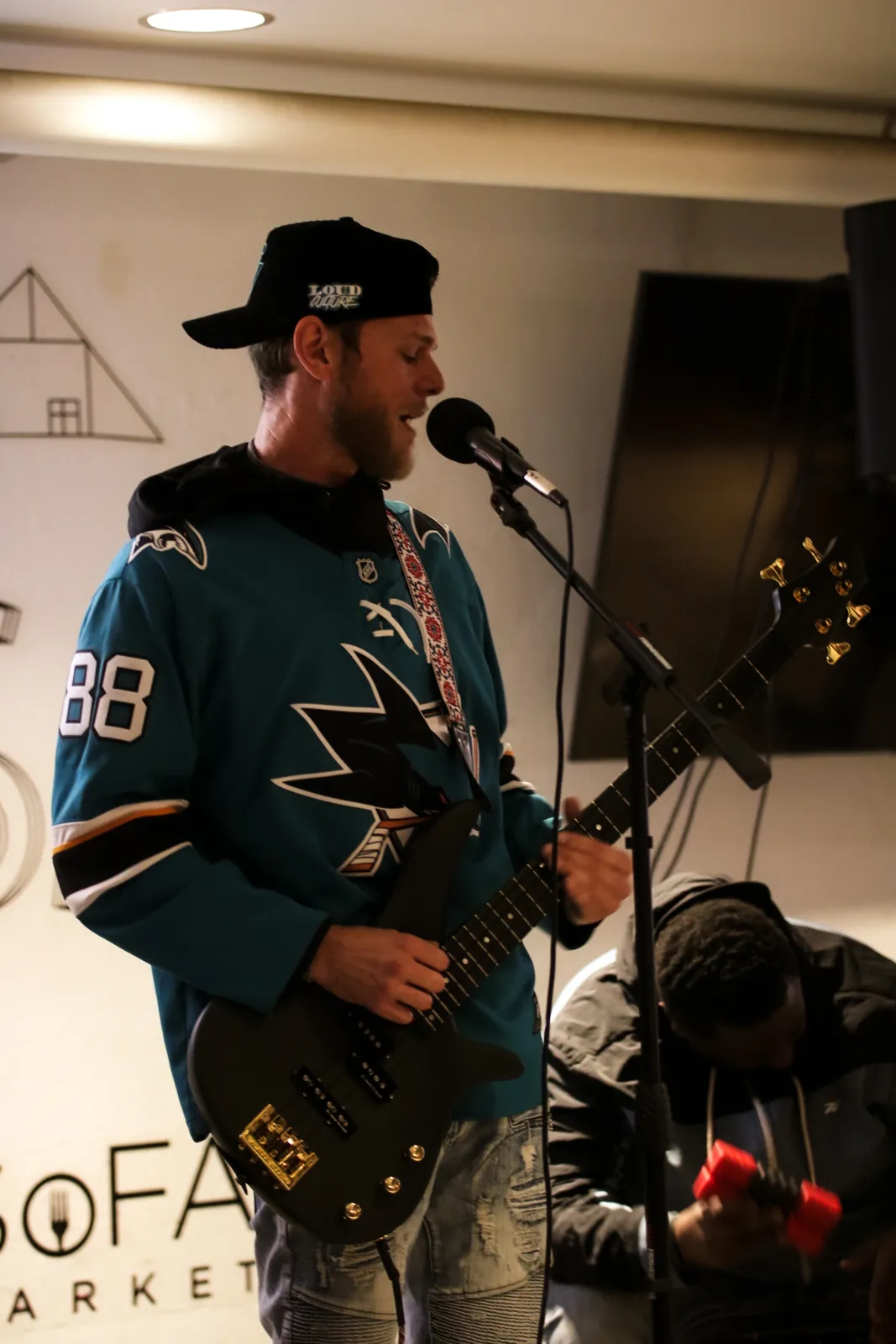 Young Hoff, host at X-Bar Artists' Showcase in Cupertino, CA