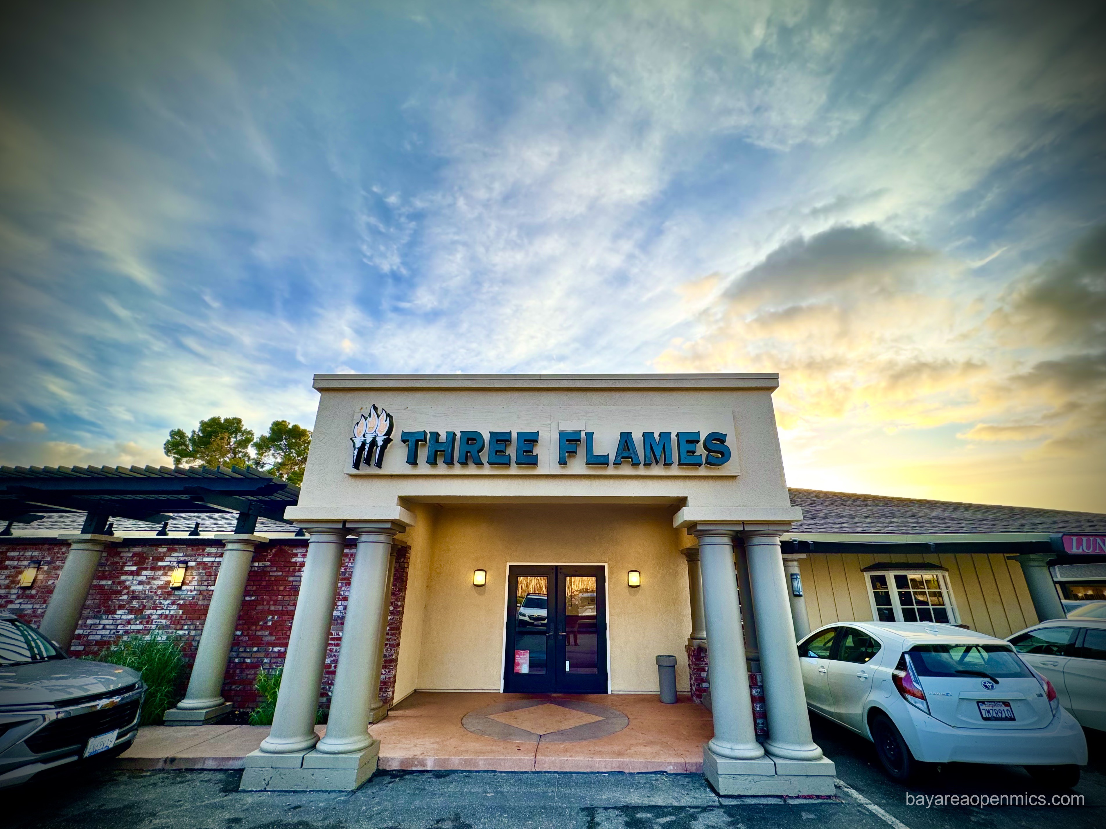 The welcoming skies at sunset outside of the Three Flames restaurant in San Jose.