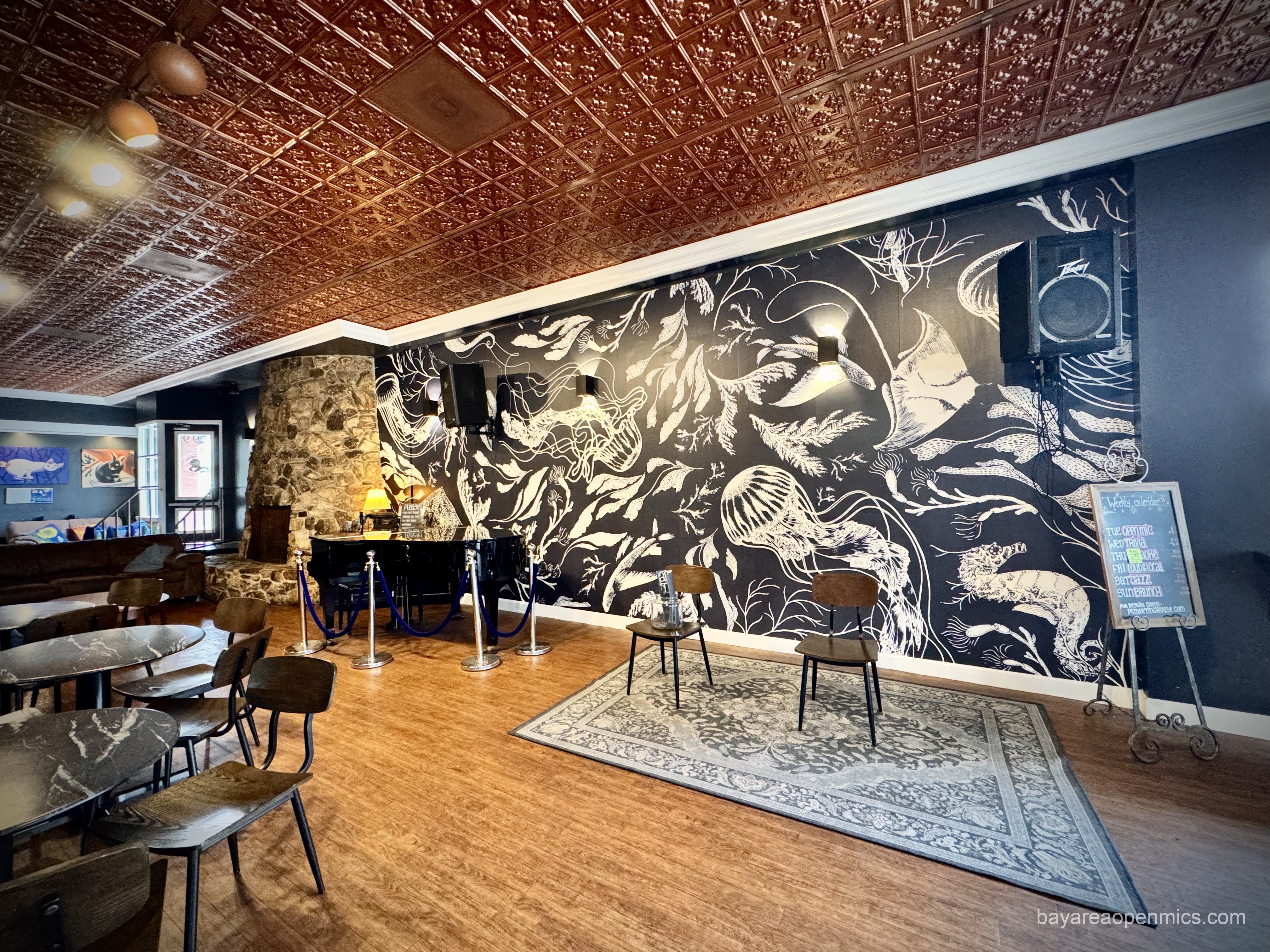 Photo of the performance area at coffee shop PG Meetinghouse in Pacific Grove, CA
