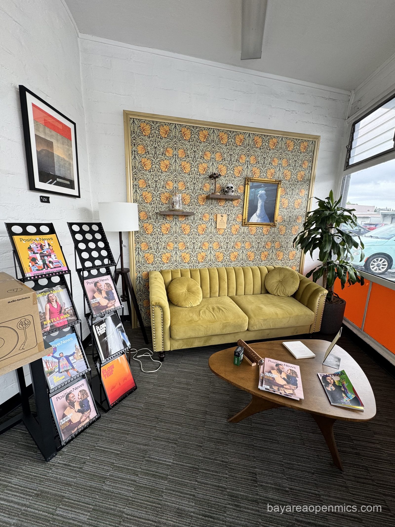 A couch in one of the comfy sit-and-listen areas at Up The Creek Records